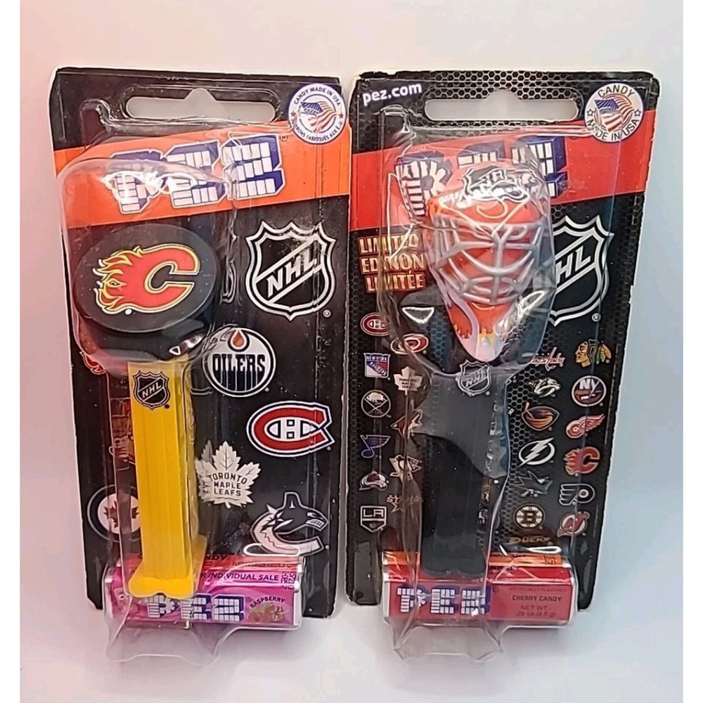 Lot Of 2 Pez Candy Dispenser NHL Calgary Flames Canadian Team Pucks & Goalie